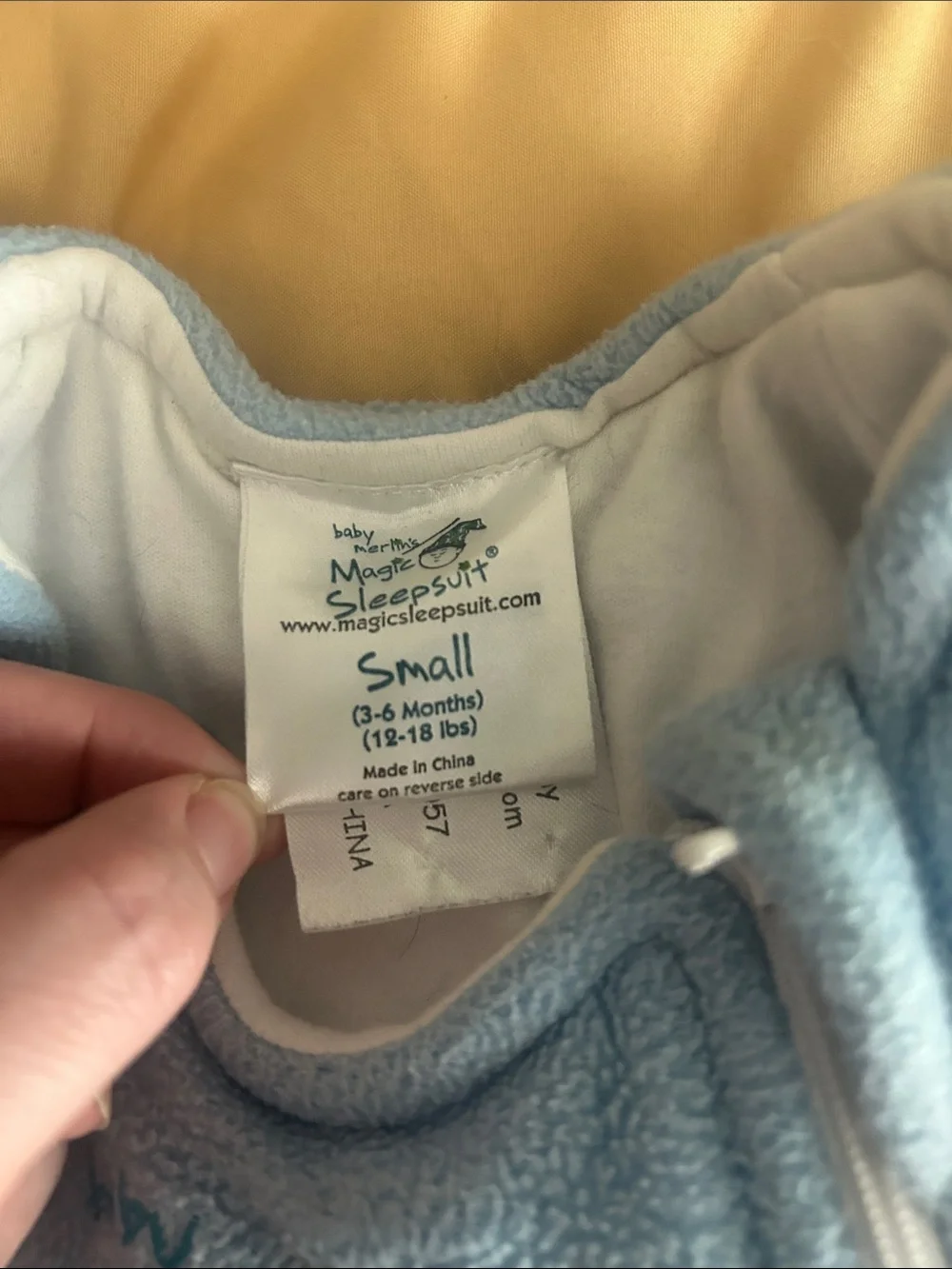 Baby Merlin size 3-6months small 12-18lbs.  Baby Merlin’s magic sleepsuit blue